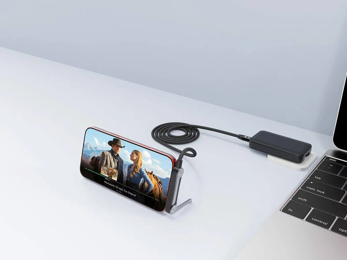 Conceptronic ETTA13B12 cable supporting a phone while connected to a separate charger