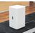 Ubiquiti UNAS-2-W white NAS shown on a desk; computer is contextual and not included