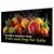 Philips 43BDL5050D commercial display at an angle; promotional fruit and vegetable artwork is illustrative.