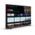Angled front view of the black Philips 43HFL4518U/12 hospitality TV on its included edge feet; app and channel artwork is illustrative, subscriptions are not included.