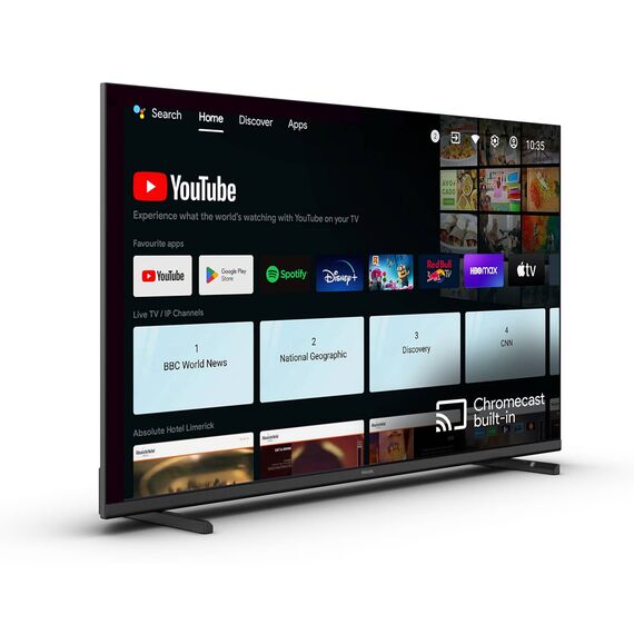 Angled front view of the black Philips 43HFL4518U/12 hospitality TV on its included edge feet; app and channel artwork is illustrative, subscriptions are not included.