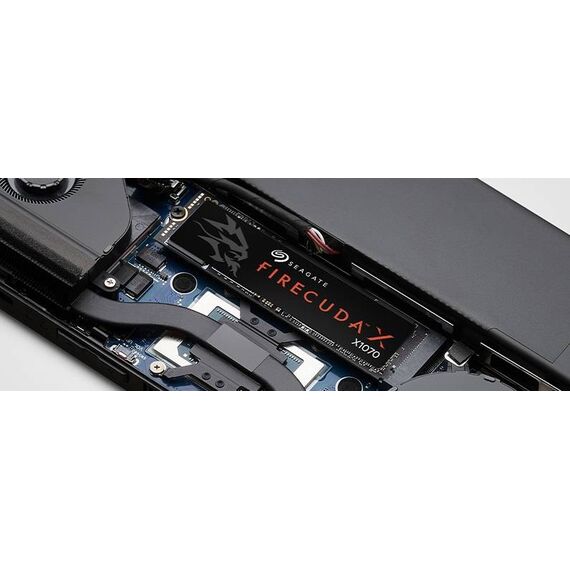 Seagate FireCuda X1070 SSD shown installed in a handheld device in a manufacturer datasheet image; device sold separately.
